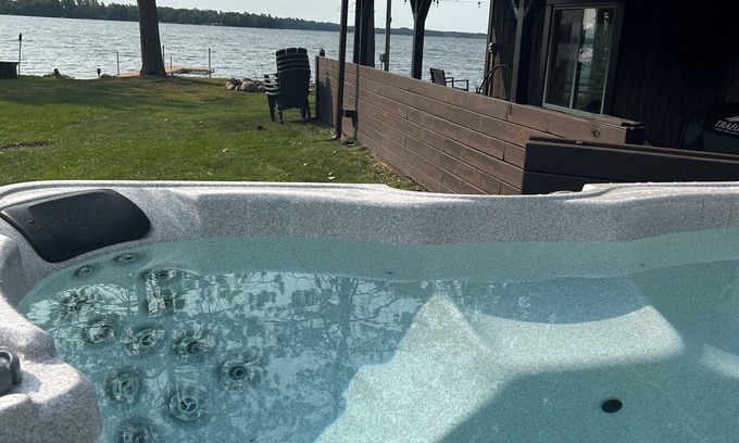Sturgeon Lake House | 3b 2ba +loft Lakefront escape with level lot and hot tub! Pontoon available