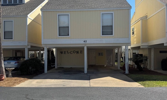 Holiday Isle Villa | 3BR Villa in Sandpiper Cove with private beach access and multiple amenities.