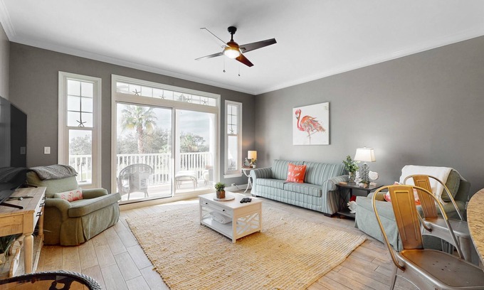 Upper Grand Lagoon Condo | 3rd-floor beach view condo with resort amenities, private balcony, W/D, & AC