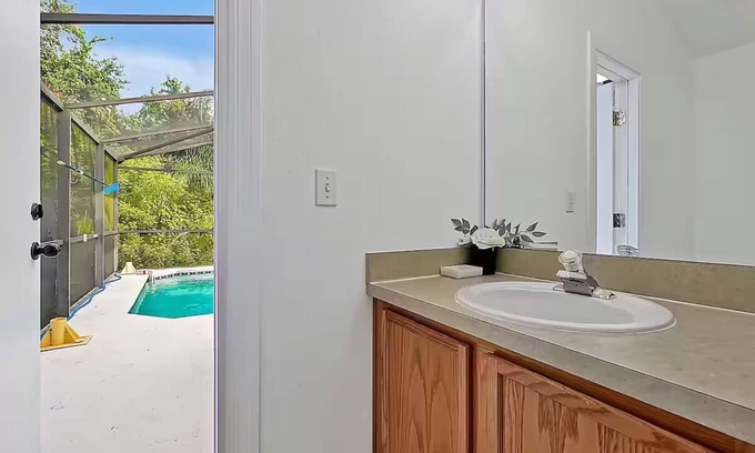 Clear Creek House | 4Bd 3 Bath Modern Poolhouse w/Game Room & Pool Close to Disney!