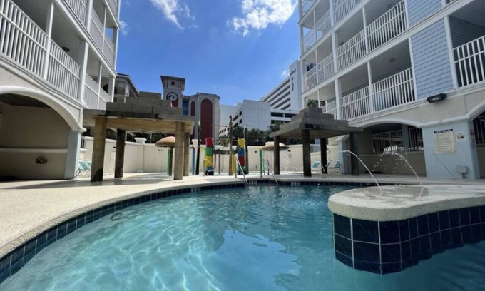 Myrtle Beach Apartment | 4BR/3B sleeps 14 Across from the Beach!