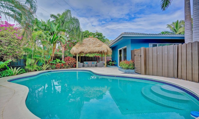 Coral Ridge House | 4BR Heated Pool Home with Tiki Hut!
