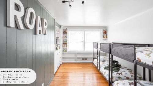 Lawrence Villa | 5BR 2BA Fun Family Home Sleeps 12 Pinball TVs 15m DT