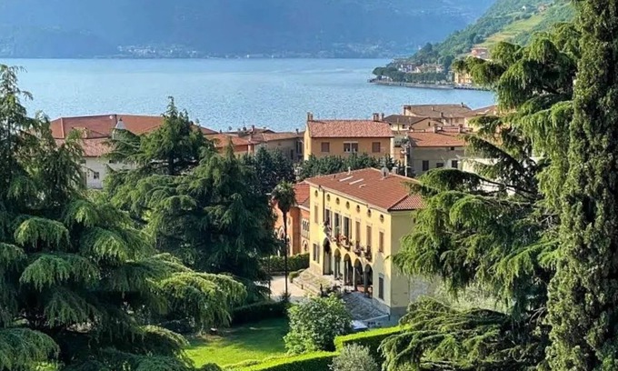 Tavernola Apartment | 80sm fully-equipped apartment on lakeside with garden, gazebo and private parking