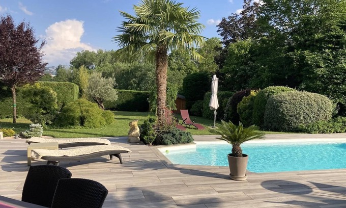 Pringy Villa | A 6 KM FROM THE LAKE ANNECY VILLA GARDEN LIGHT AND WITH TREES HEATED POOL