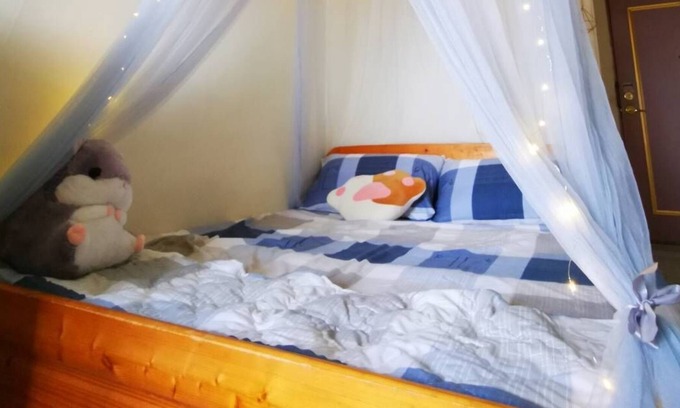 East District Apartment | A cozy room with story from FaFa