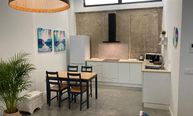 Tiro de Linea-Santa Genoveva Apartment | Acogedor apartamento en semisótano con patio y cerca de la Plaza de España