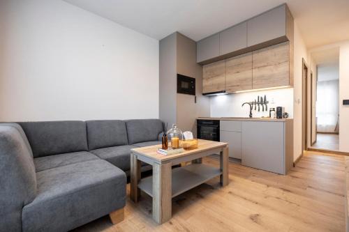 Banska Bystrica Apartment | ALURE RESIDENCES 5 & 24h self check-in, private parking in front of the apartment building included, new building, the apartment building has its own park with a lake and outdoor fitness, children's playground, CITY CENTER