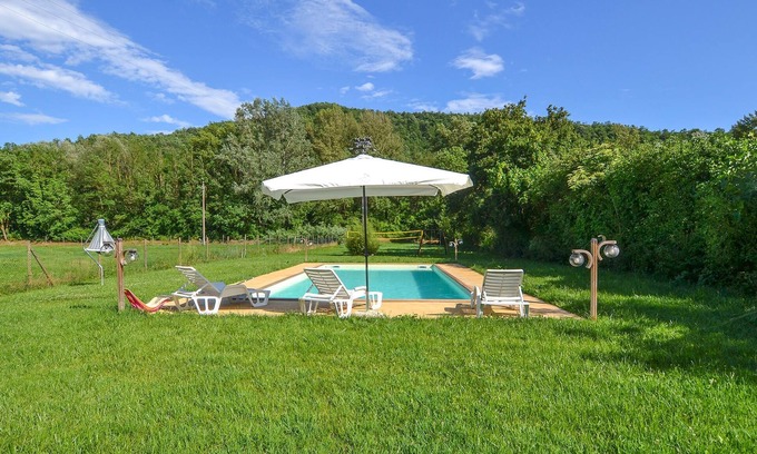 Bivio Lugnano House | An original cottage in an old mill with large fenced garden and private pool.