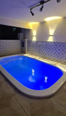 Praia Grande House | Apartamento perto de praia Dos Anjos
