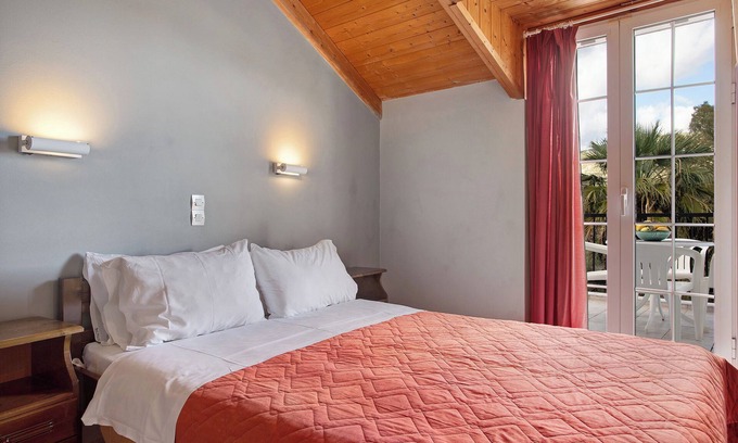 Limni Keri Apartment | Apartment "Dolphin Apartment Sea View 12" with Private Balcony, Shared Garden & Wi-Fi