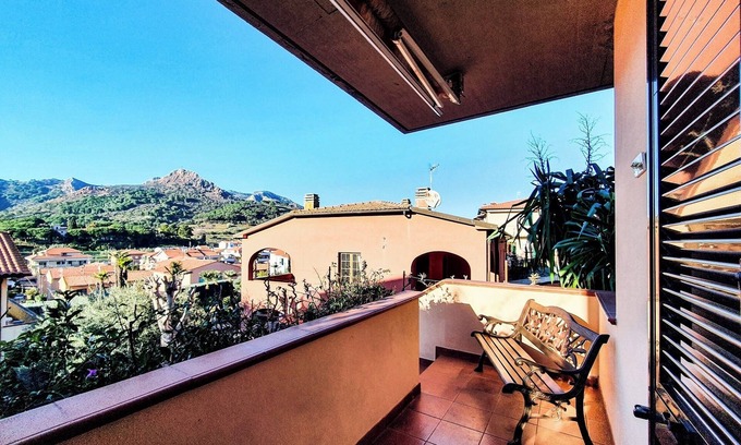 Porto Azzurro Apartment | Apartment 'Il Porto' Near the Beach with Balcony, Terrace & Garden