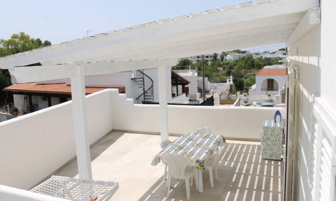 Santa Maria di Leuca Apartment | Apartment with large porch in a quiet area