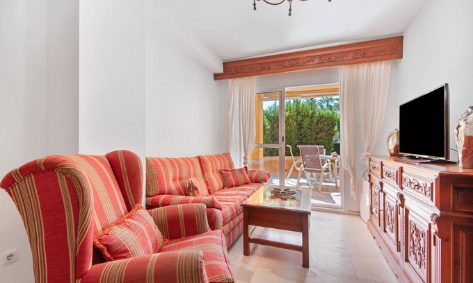 Islantilla Apartment | Apartment 'Las Arenas' with Shared Pool, Private Terrace and Wi-Fi