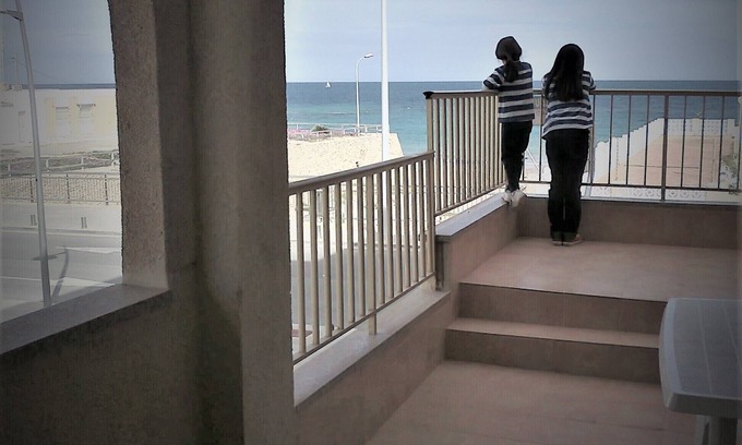 Torre de la Horadada Apartment | Apartment with large terrace by the sea, next to the beach
