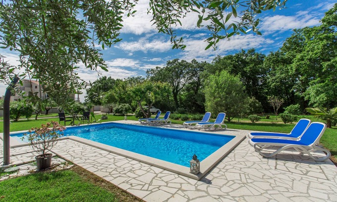 Susnjici Apartment | Apartment with pool, garden, air conditioning, barbecue, children's playground