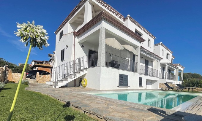 San Lorenzo Apartment | Apartment with sea view, terrace, pool and garden for sole use