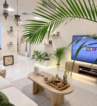 Nad Al Sheba Apartment | Arabian-Inspired 1BR - Polo Residence Near Burj
