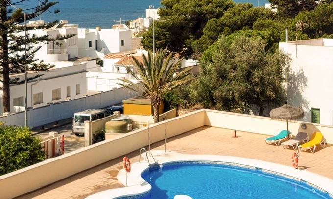Los Canos de Meca Apartment | Are you dreaming of a sunny family vacation? Then this vacation apartment with shared pool and sea v