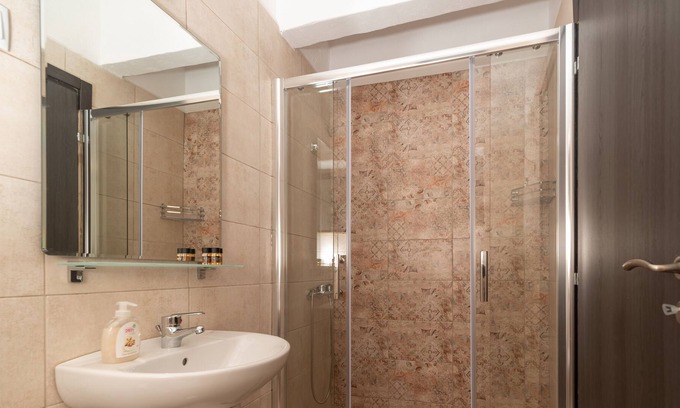 Karavostasi Apartment | Artemis -Traditional stone built studio apartment