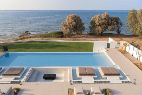 Skaleta Villa | Asea Villa, Spectacular right-on-the-beach Retreat, By ThinkVilla