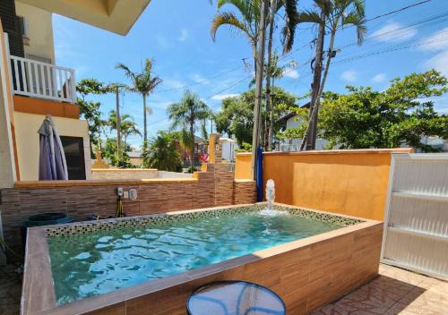 Pontal do Parana House | ATAMI STAY Casa em Condomínio com Piscina Aquecida pertinho do Mar