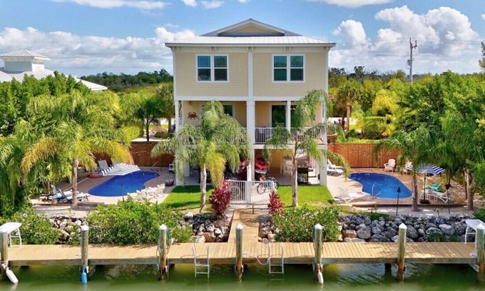 Marathon House | Attn Large Groups: Waterfront home w/8 Bedrooms, 2 pools & a private dock