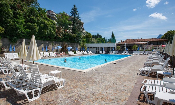 Susello Apartment | Attractive 2-room apartment with sunny balcony, pool and dream lake view