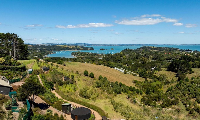 Palm Beach Cabin | Awaawa Yurts - Tane Yurt - Awaawa Yurts offer a luxury glamping experience on Waiheke Island. Stunning views, luxury queen sized bed, private bathroom with tea and coffee making facilities.
