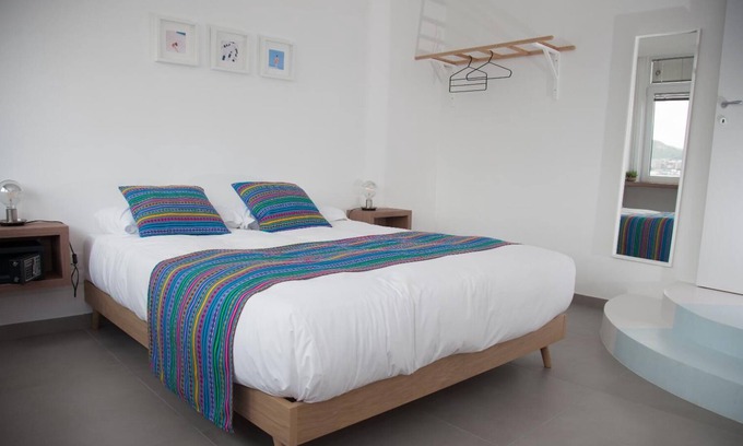 Fuorigrotta Apartment | Azzurro apartment with double bedroom and living room / kitchen with sofa bed and private bathroom