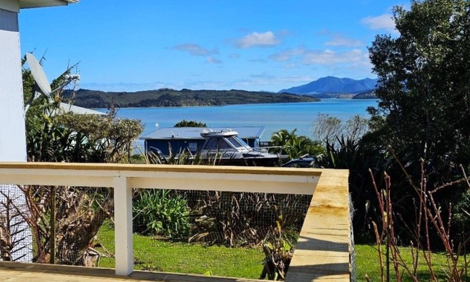 Rawene House | Bach with beautiful harbour views in historic Rawene village.