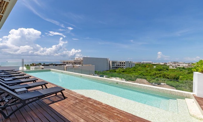 Zazil-ha Apartment | Bahay Condos steps from the beach and 5th ave