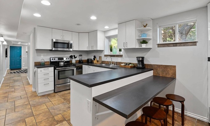 Sandy Apartment | Basement Retreat: Private Entry, Updated, Ski Passes, Sleeps 8, Near Trax Station, 3 TVs, Patio!