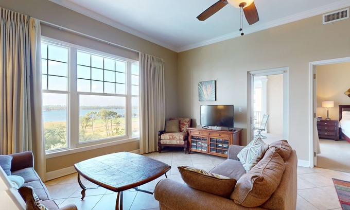 Upper Grand Lagoon Condo | Bayfront condo w/amazing views, shared hot tub & community pool