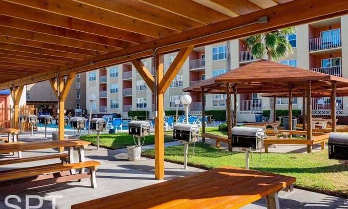 South Padre Island Condo | Beach access Condo Nice pool/hot tub area w/bbq 2 Bedroom Home by RedAwning