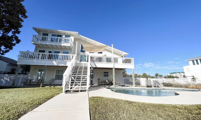 Holiday Isle Villa | BEACH BOATING PARADISE-Heated Pool, 2 King Suites,90FT Boat Dock,Game Room,Bikes