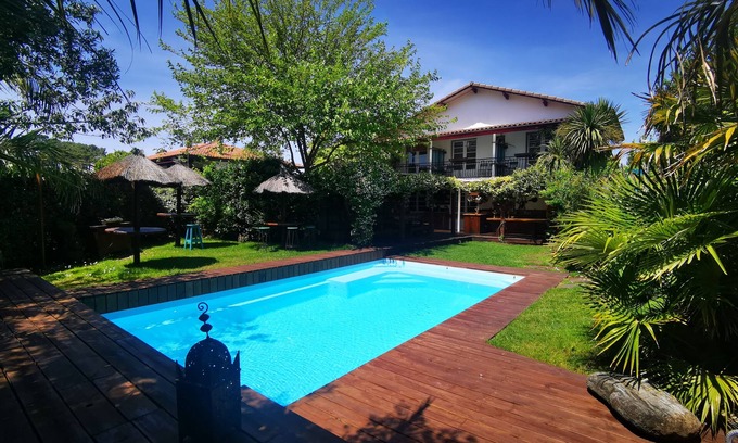 Mimizan-Plage Villa | "Beach House" in SW France, tropical garden, pool and room for 27 people.