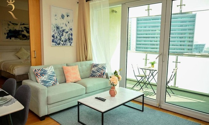 Al Raha Beach Apartment | Beachfront Beauty: 1BR Retreat for Your Getaway