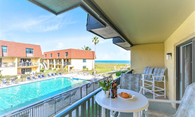 Avon By The Sea Condo | 🌴Beachfront Family Retreat: Pool, Private Balcony & Walk to the Pier