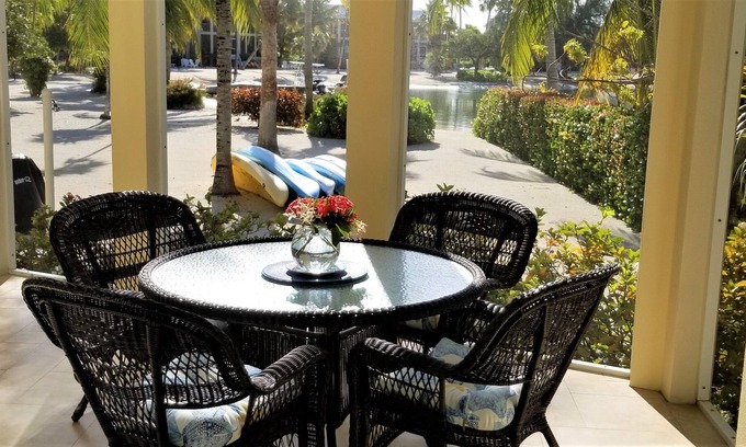 Rum Point Villa | Beachfront Luxury Living Directly On Palm-Lined Cove - kayaks and bikes included
