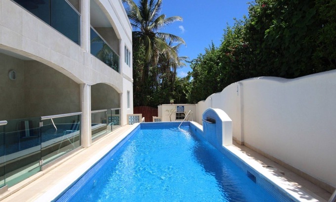 Atlantic Shores Villa | Beautiful, airy 3 bedroom second-floor unit with views of the ocean and pool.