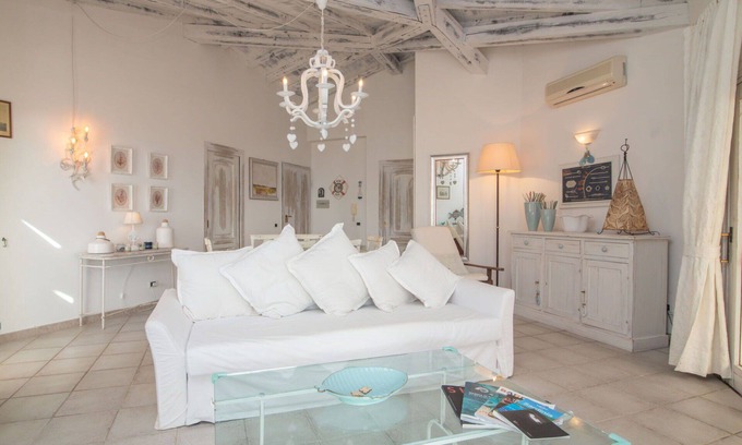 Baia Caddinas Apartment | Beautiful apartment for 4 people with pool, WIFI, A/C, TV, terrace and parking