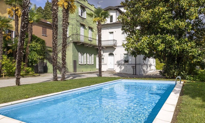 Meina Apartment | Beautiful apartment for 4 people with pool, A/C, TV and parking