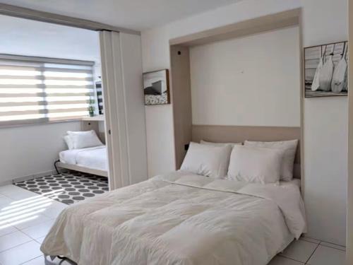 Jayuya Apartment | Beautiful apartment in Condado with beach access!