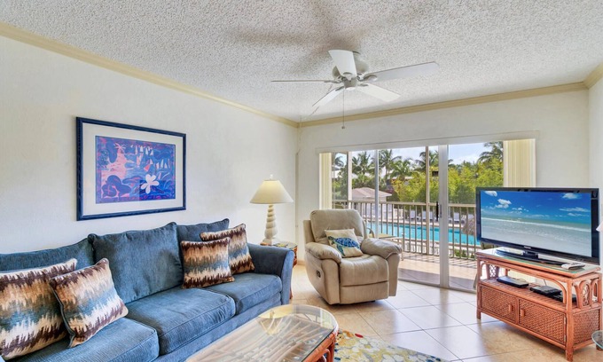 Sanibel Condo | Beautiful Beach Front Complex - Private Walkway To The Beach - Pool View