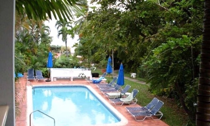 Trents Condo | Beautiful Condo on White Sandy Beach-Crystal Turquoise Waters