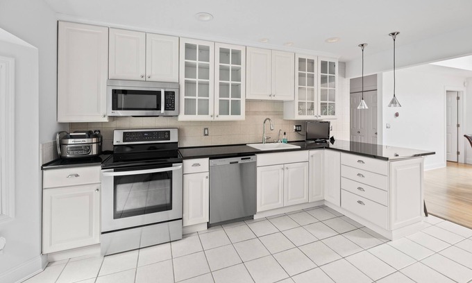 East Quogue House | Beautiful dog-friendly property with pool, grill, fireplace, AC, and open layout