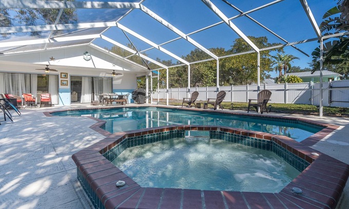 Palma Sola House | Beautiful home- Private getaway-Heated Pool/HotTub Close to IMG