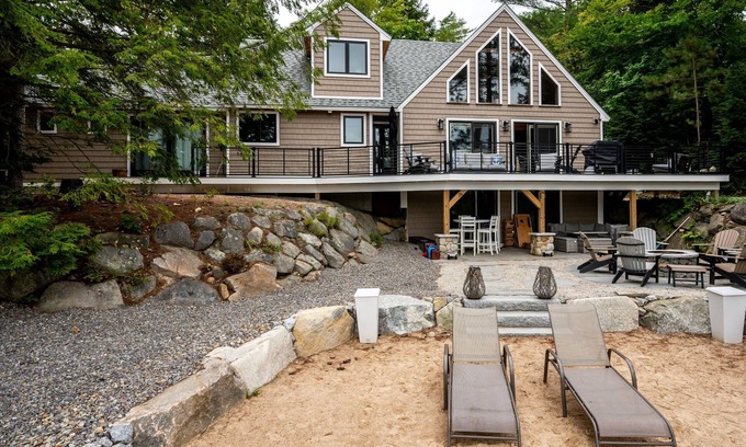 Moultonborough House | Beautiful new home sleeps 9 with perched sandy beach and steps into the water