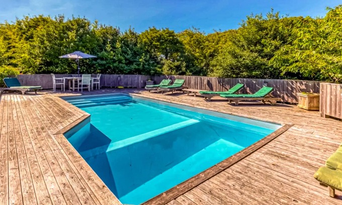 Fire Island Pines House | Beautiful ocean-view home near beach with private heated pool, fireplace, & deck